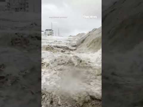 WATCH: Man knocked over by wave from Hurricane Erin surge #shorts #hurricaneerin