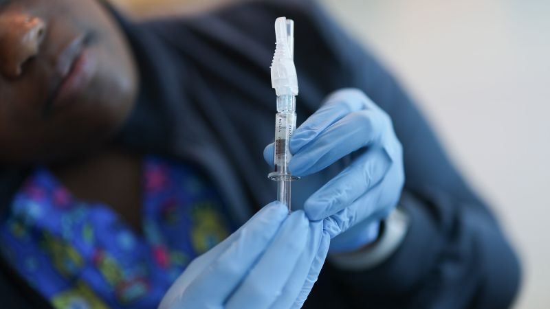 FDA approves updated Covid-19 vaccines for more limited groups as US cases continue to rise