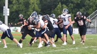 PHOTOS: Hudson uses big plays to race past Fowler in 2025 season opener