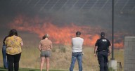 Large grass fire burning near Reserve Street, I-90, prompting evacuations