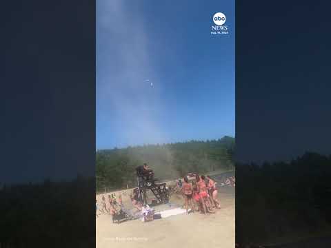 Dust devil sends people running for cover at New York lake