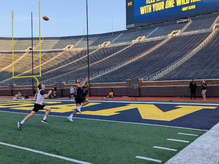 Pushing pickup trucks and throwing TDs: Inside Michigan basketball’s intense summer workout