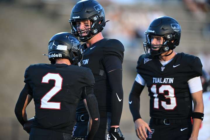 Still figuring things out at quarterback, Tualatin opens the 2025 season with a big win over Clackamas