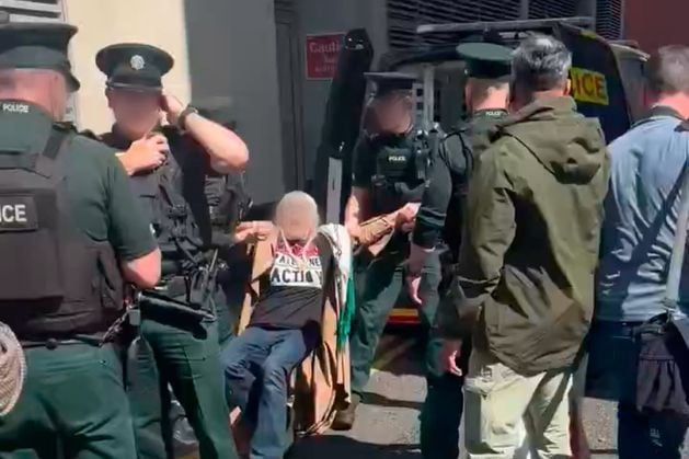Woman arrested in Belfast for wearing Palestine Action t