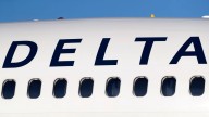 Delta plane clips empty jet during pushback from gate at Atlanta airport