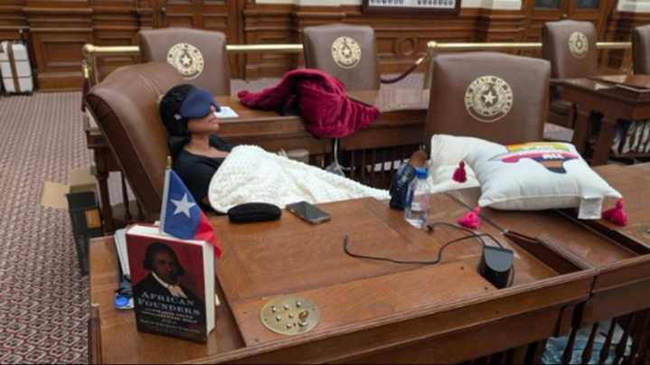Texas lawmaker refuses police escort, spends to night in the House Chamber, complete with props