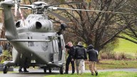 Manhunt underway in rugged Australian bush after gunman kills two policemen