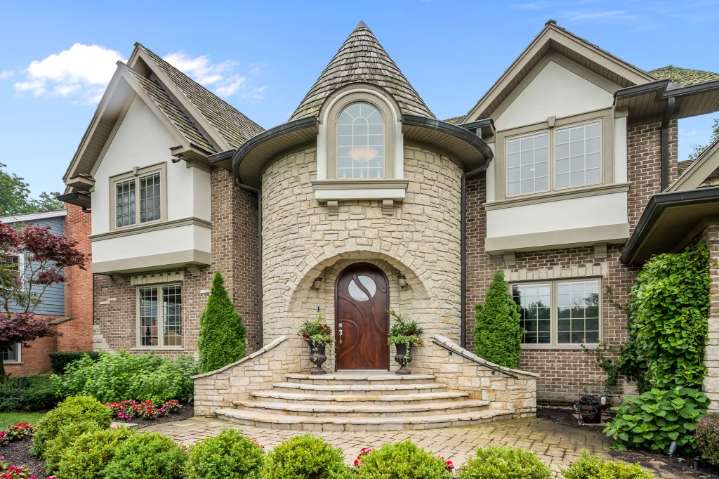 Glenview 5-bedroom home with marble foyer, curved staircase: $2.3M