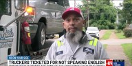 Two truck drivers ticketed in DeKalb County for not speaking English