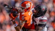 Clemson star WR Antonio Williams taken to the locker room after limping off field vs. LSU