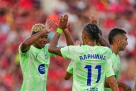Barcelona inicia la defensa de su título con triunfo ante Mallorca con goles de Raphinha y Yamal