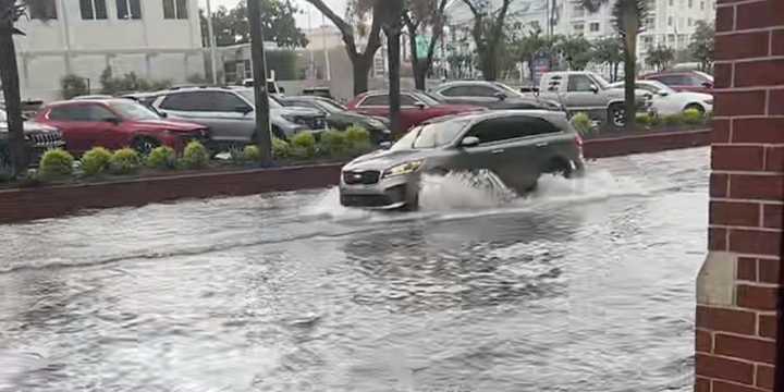 Flash Flood Warning issued in Charleston, South Carolina, due to heavy rain, high tide