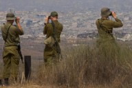 Israeli gunfire kills at least 25 in Gaza as Netanyahu says he will allow Palestinians to leave