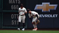 Giants' Jung Hoo Lee makes catch off glove, thigh and calf before pinning baseball between knees