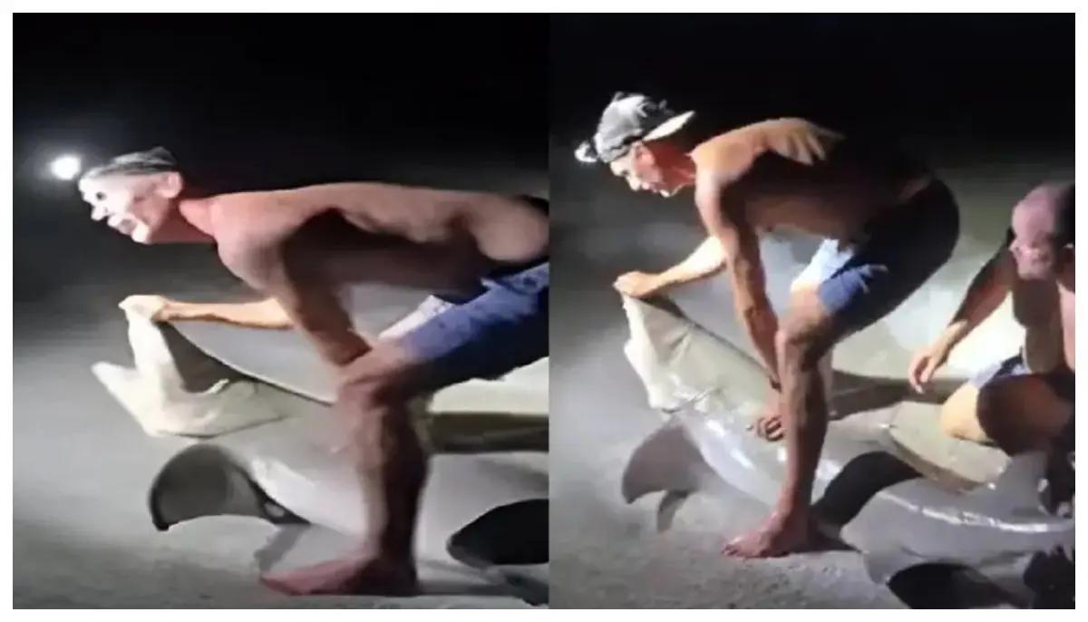 Un pescador fue mordido por un tiburón luego que lo sacaran del agua para tomarse una foto (VIDEO)