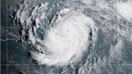 Hurricane Erin rapidly intensifies to a Category 5 storm in the Caribbean