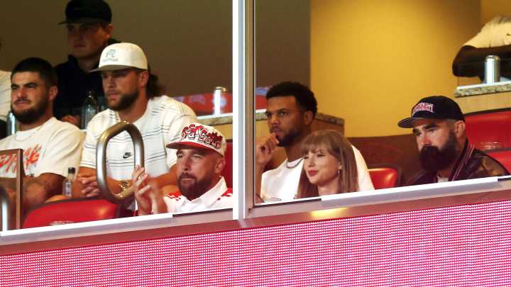 Why is Taylor Swift at a college football game?