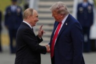 Trump and Putin shake hands warmly in Alaska to kick off their summit on the war in Ukraine