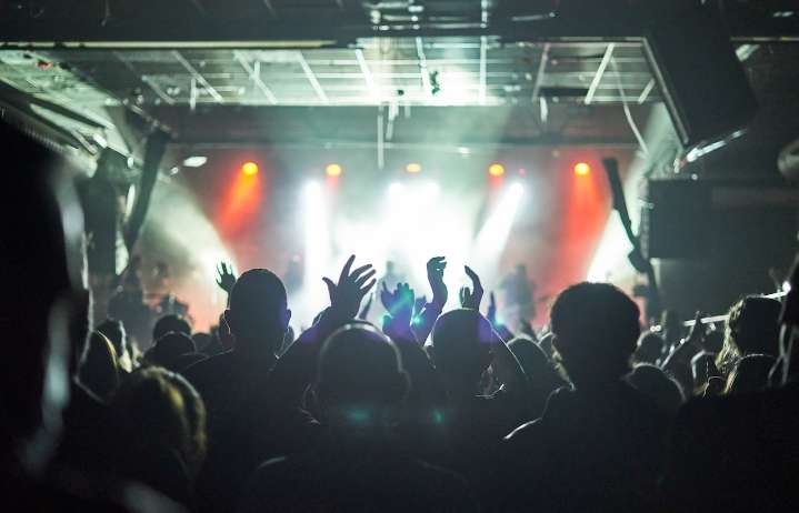 Popular rocker collapses on stage, band cancels festival set