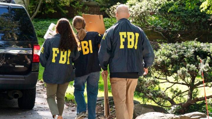 Live updates: Bolton home raided by FBI; Powell signals interest rate cut likely