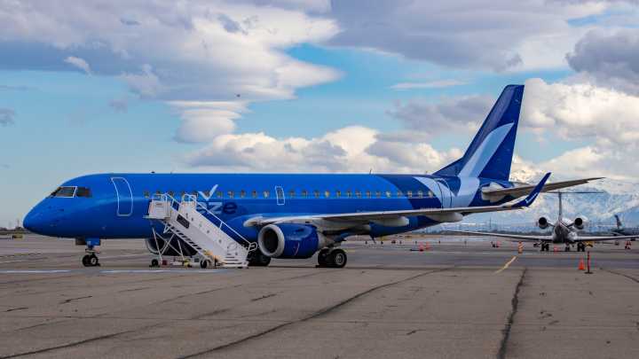 Sky-High Brawl: Breeze Airways Flight Diverts To Colorado After Unruly Passenger Yells Racial Slurs & Waves Skateboard