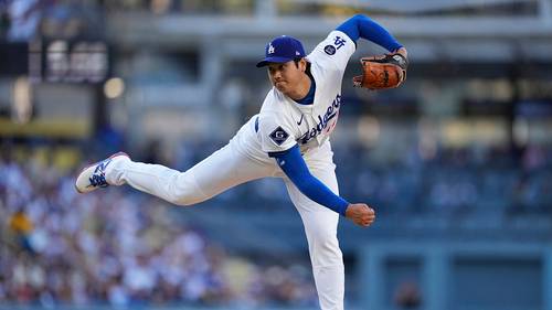 Shohei Ohtani strikes out 9, gets 1st win with Dodgers on his bobblehead night