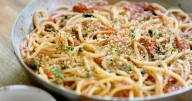 Bucatini with burst cherry tomatoes and fried caper crumbs offers ample flavor