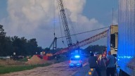 State Police: Two injured after driver hijacks crane, causes multiple crashes on I