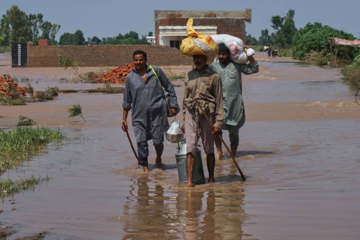Floods displace nearly 250,000 people in Pakistan as three major rivers overflow