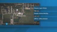 Police arrest 3 law enforcement officers accused of assaulting man at Illinois bar