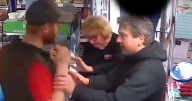 Moment thug threatened Bristol shop staff with broken wine bottle