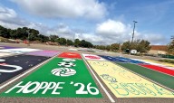 Novi High School seniors claim their parking spots with art