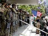 Judge weighs whether Trump violated federal law by deploying National Guard to Los Angeles