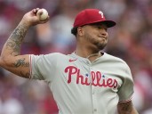 Schwarber hits his 42nd homer in a 4-run 8th inning as the Phillies rally past the Reds 4