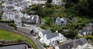 Dilapidated house hidden in greenery with stunning views up for sale for £450k