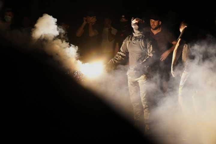 Why has violence flared up in Serbia