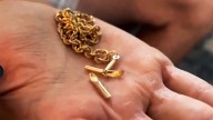 Florida man survives stray gunshot after his cross necklace deflects bullet
