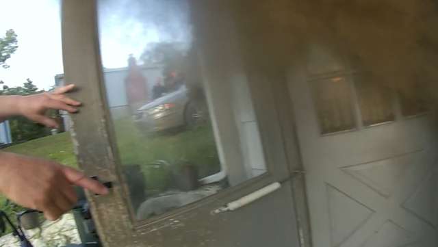 Body camera video shows 77-year-old man rescued from Indiana house fire