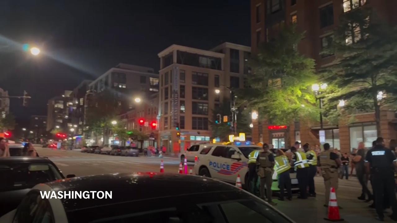 DC residents protest law enforcement presence at a vehicle checkpoint