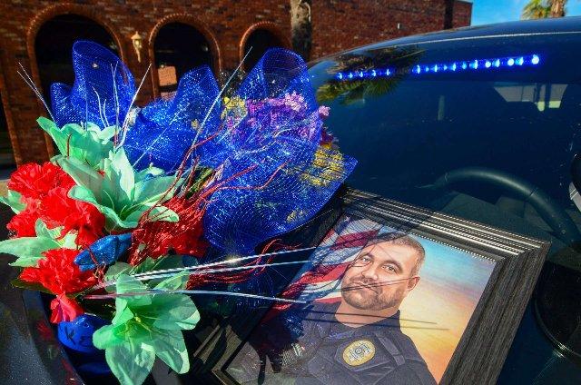 Slain McComb officer’s qualification for death benefits still unclear