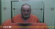 Man arrested after holding family at knifepoint, firing shots at officers in Harlan County standoff