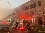 Firefighters battling 3-alarm blaze at 100