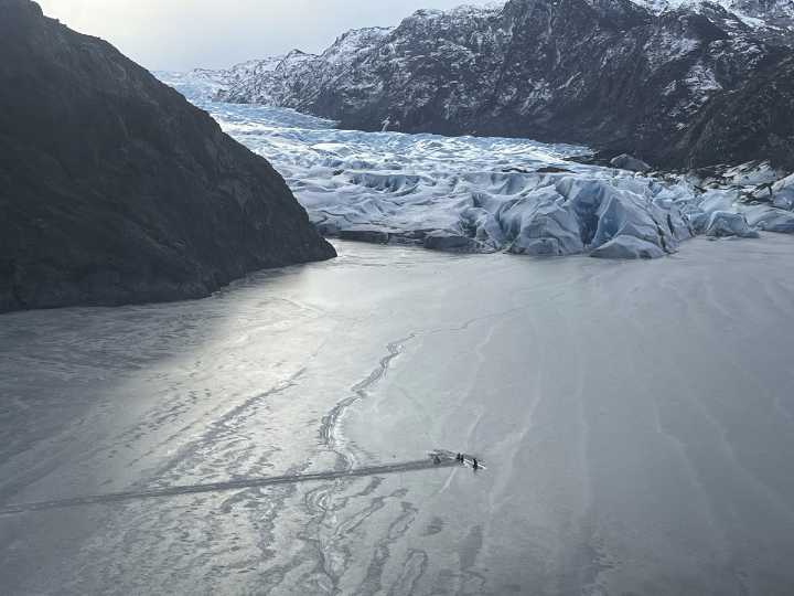 Floodwaters from glacier near Alaska's capital city break record levels and prompt evacuations