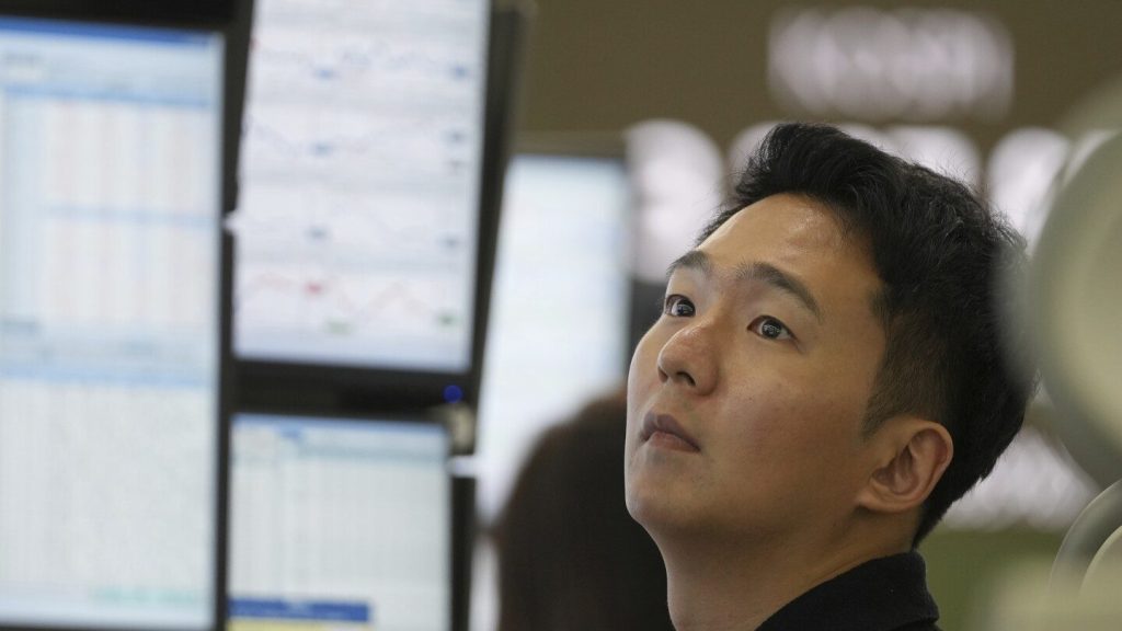 Asian shares are mixed after stocks add a bit to their records on Wall Street