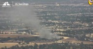 Fire crews halt Sherman Oaks brush fire; officials warn of delays on 405 Freeway