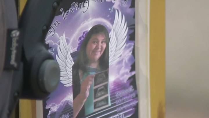 Vigil for pregnant mother killed in crash sparks calls for pedestrian safety improvements