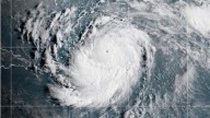 Hurricane Erin rapidly strengthens to rare Category 5 storm