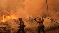 Colorado prison evacuated as growing wildfire becomes one of the largest in state history