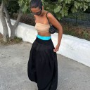 Goodbye, Bubble Shorts—Everyone Everywhere Is Wearing This "Dated" Pant Trend Instead