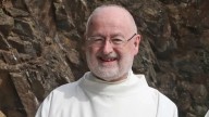 Priest injured in church attack as police investigate Northern Ireland murder